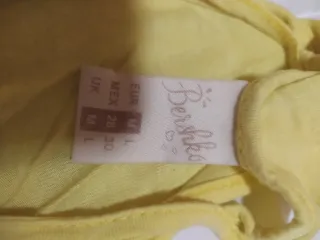 Top floral amarillo con lazada