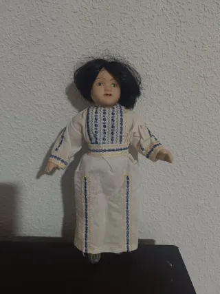 Bambole di porcellana articolate