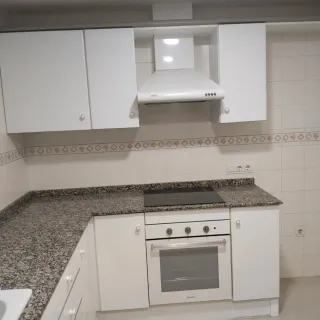 Mobiliario de cocina piedra y madera