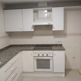 Mobiliario de cocina piedra y madera