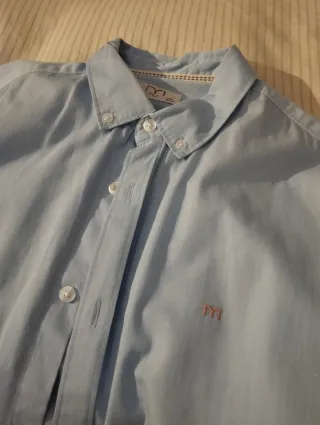 Camisa azul claro de chico sin usar