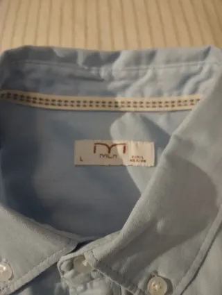 Camisa azul claro de chico sin usar