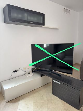 Sofá de tela gris y metal