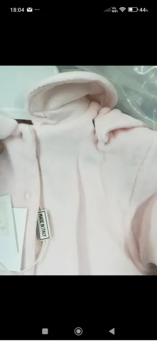 Cappottino rosa neonata con carrozzina