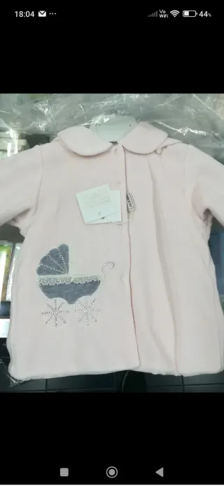 Cappottino rosa neonata con carrozzina