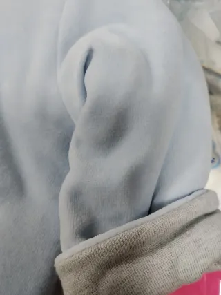 Cappottino neonato azzurro con aeroplano