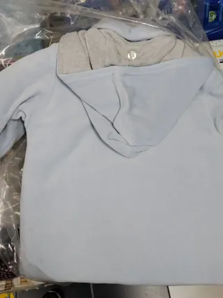 Cappottino neonato azzurro con aeroplano