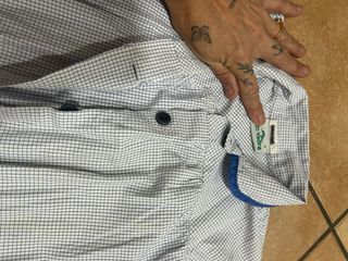 Bata escolar con bolsillo de lápices