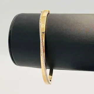 Pulsera rígida 18K con circonitas