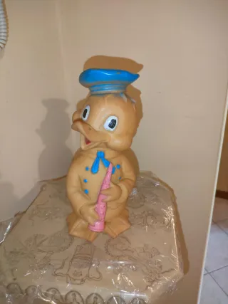 Gioco vintage Paperino con strumento musicale