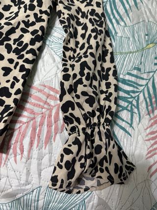 Blusa animal print manga larga