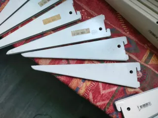 Cartela doble adaptable sobre guía