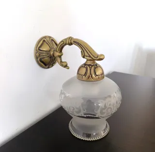 Applique in bronzo e cristallo