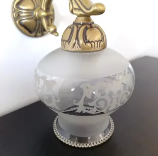 Applique in bronzo e cristallo