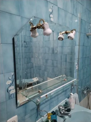 Espejo de baño cristal y metal dorado