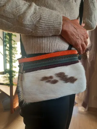 Pochette in pelle e pelo