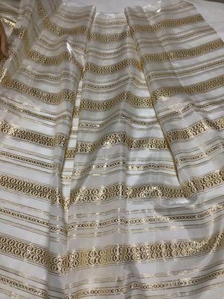 Tejido antiguo blanco y oro
