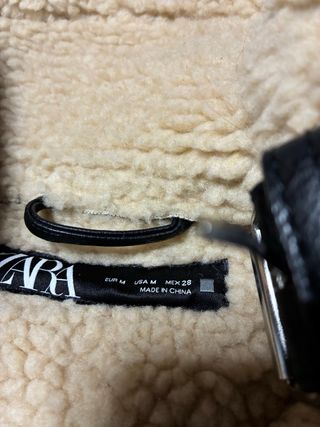 Chaleco de cuero sintético con borreguito