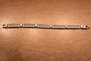 Bracciale in acciaio con maglie decorate