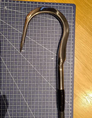 Garfio de pesca de fibra de carbono y acero