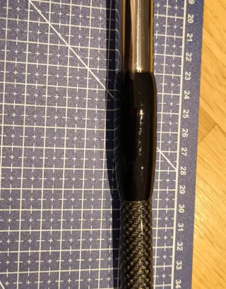 Garfio de pesca de fibra de carbono y acero