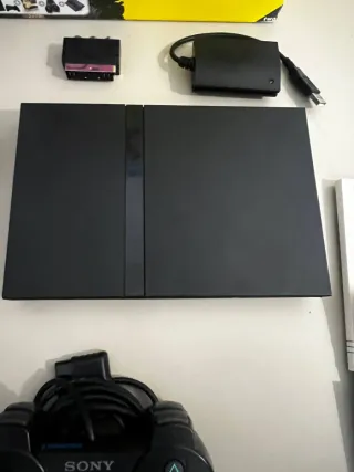 PS2 Slim Come Nuova + Bundle SingStar con scatola
