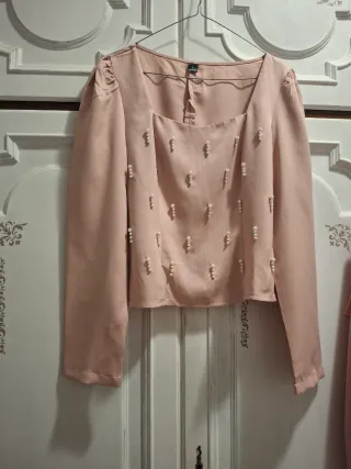 Maglietta rosa con perle