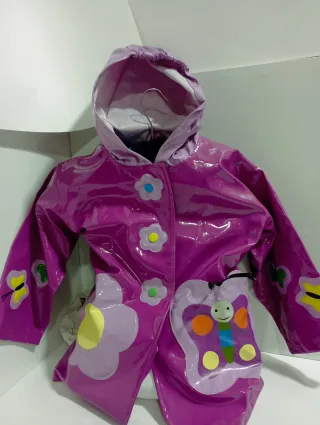 Impermeable infantil morado con flores forrado