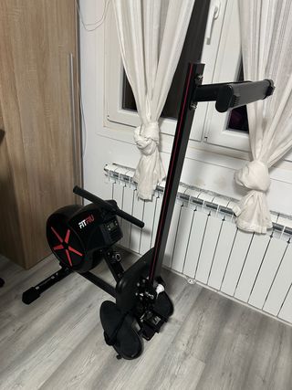 Máquina de remo plegable.