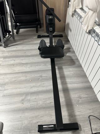 Máquina de remo plegable.