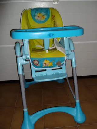 Trona de bebé azul y verde con dibujos