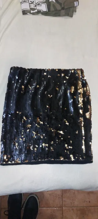 Falda lentejuelas cambia de color negro dorado S