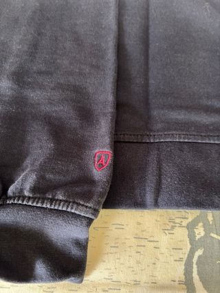 Sudadera azul con bicicleta