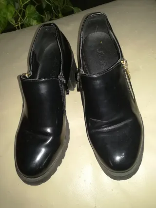 Mocassini neri con zip