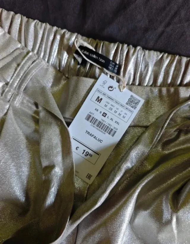 Pantalón plateado Zara