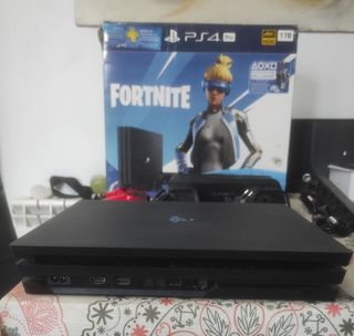 PS4 Pro 1TB con caja y accesorios