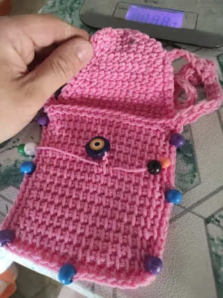 Bolsito rosa tejido a ganchillo