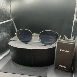 Occhiali da sole Prada metallo oro e neri