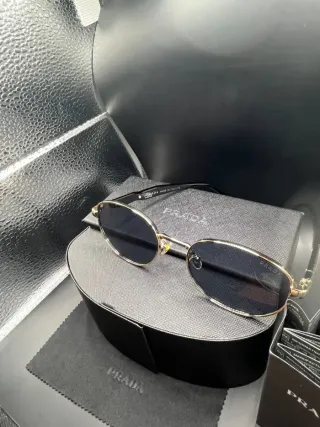 Occhiali da sole Prada metallo oro e neri