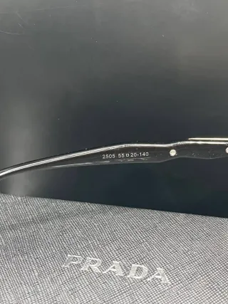 Occhiali da sole Prada metallo oro e neri