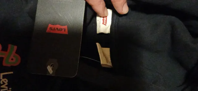 Sudadera con capucha y bolsillo delantero