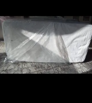 Colchón cuna con poco uso .