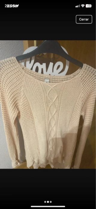 Jersey rosa muy claro tejido trenzado