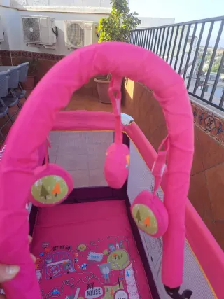Cuna de viaje rosa