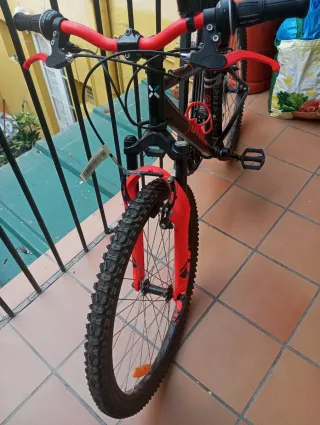 Bicicleta Montaña Negra y naranja