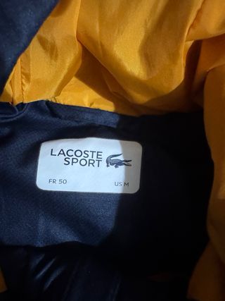 Cazadora Lacoste azul y amarilla