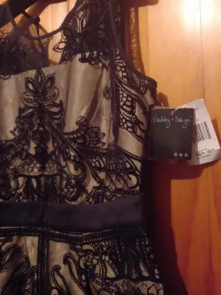 Vestido de fiesta negro y dorado