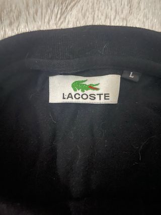 Polo Lacoste oversize logo bordado talla L negro