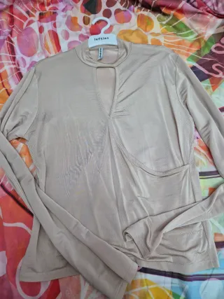 Camiseta cruzada color rosa clarito