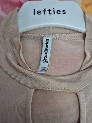 Camiseta cruzada color rosa clarito